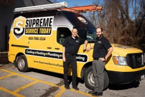 2 techs by branded supreme services truck